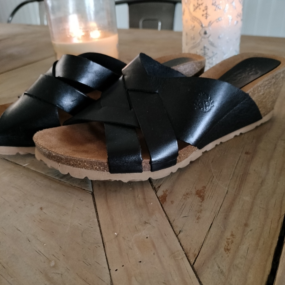 Yokono black leather criss cross wedge sandal slip on brand new. Never worn.